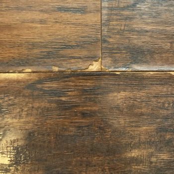 warped flooring image