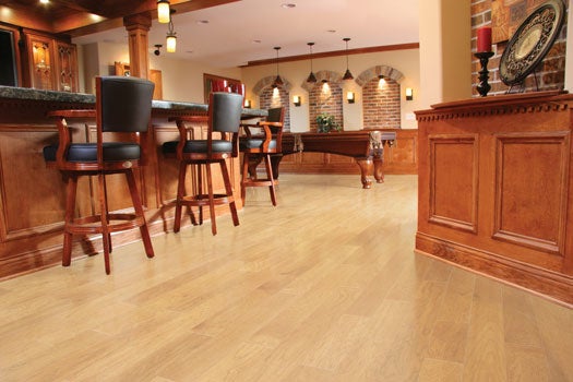 Unlike solid hardwood, engineered hardwood can be installed at any grade, even over concrete slab