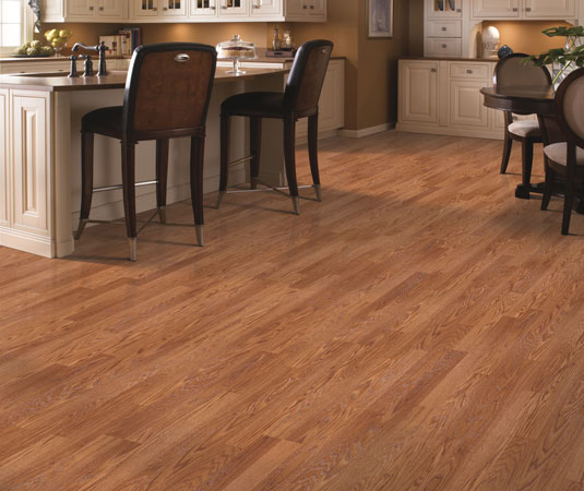Laminate flooring offers inviting wood visuals in basements for less than engineered hardwood