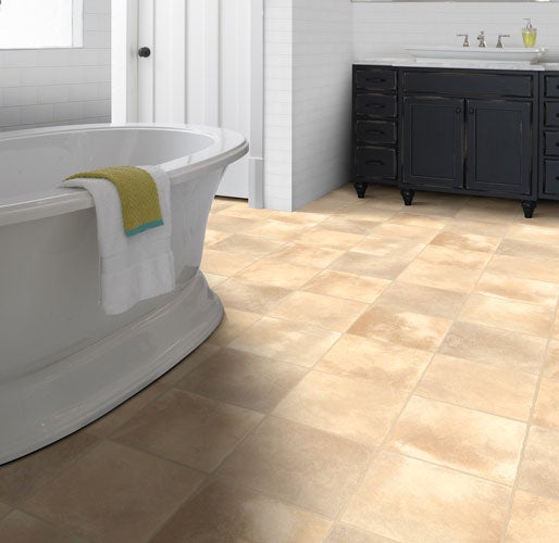 Sheet vinyl is a durable, budget-friendly option that provides the look of natural tile and stone