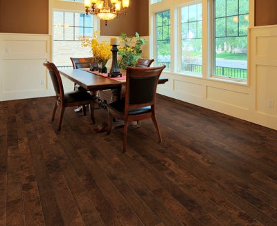 Hardwood floors and engineered hardwood floors are popular for dining rooms because they provide a classic, elegant look