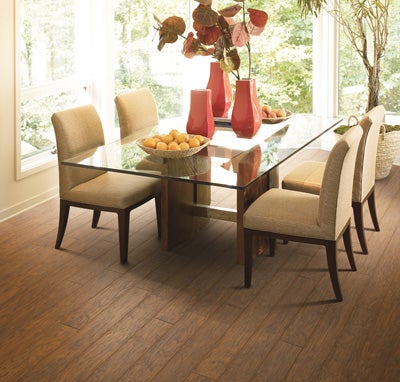 Laminate flooring is a budget-friendly choice to bring the look of wood into your dining room