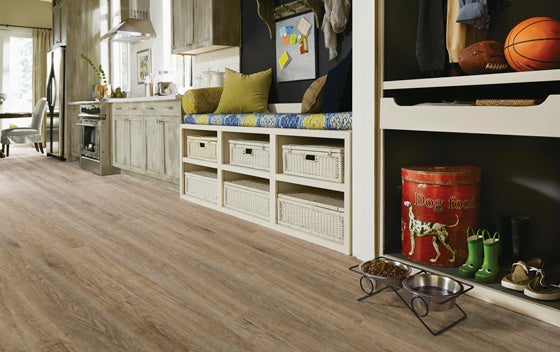 Vinyl plank is highly durable, looks and feels like real wood, and is friendlier to budgets than solid hardwood or tile