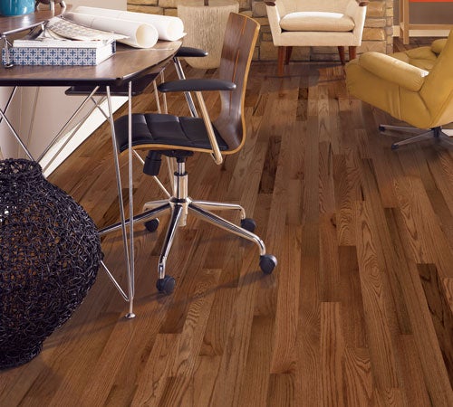 Solid hardwood and engineered hardwood can create a time-honored look for your office or study