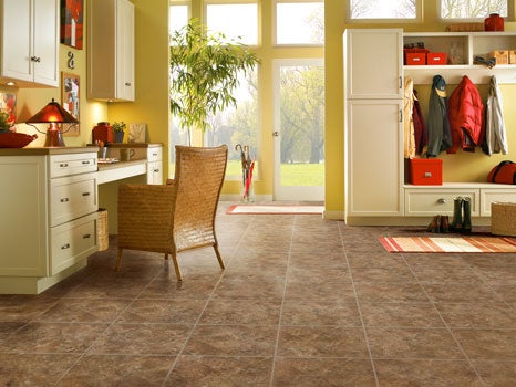 Vinyl tile in an office looks like real tile or stone, but is more durable