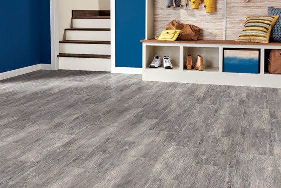 Vinyl tile provides the beautiful look of stone or porcelain tile, but has a softer surface