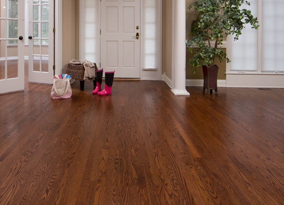 Laminate flooring is an affordable option to bring the look of hardwood to your mudroom floor or laundry room floor