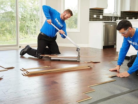 Professional flooring installation image scene