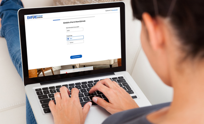 woman using laptop to get new floors