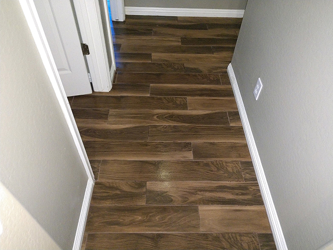 wood look porcelain tile in the hallway