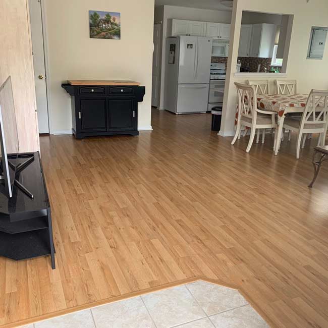 laminate flooring in the living room and hallway