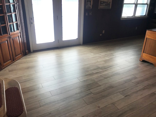 family room with laminate flooring