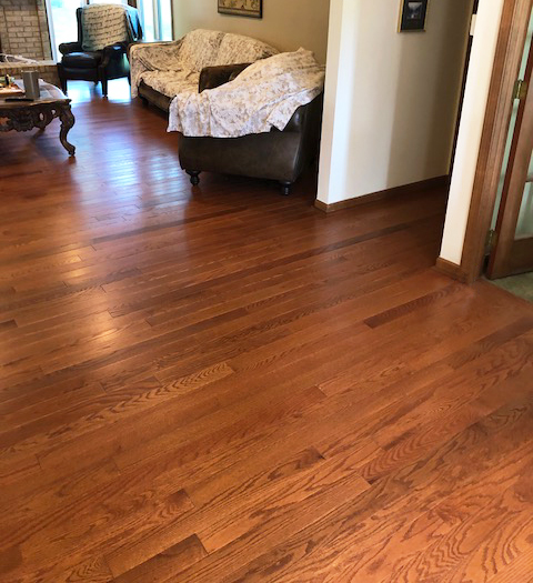 solid hardwood flooring in the living and dining room