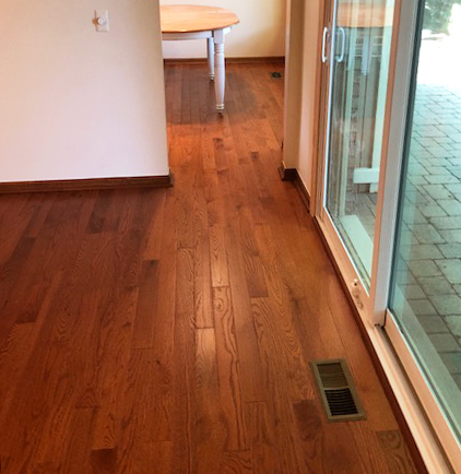 solid harwood flooring in the hallway