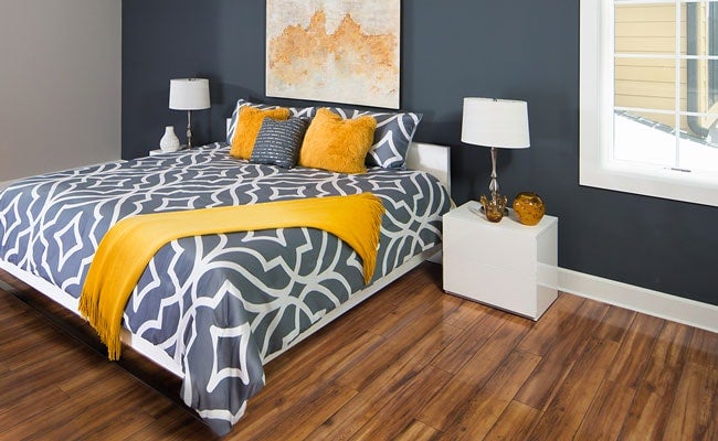 wood look flooring and cool-blue accent wall