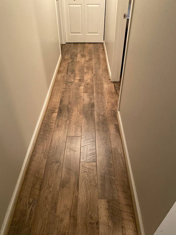Modern Look Added To Va Home With, How To Lay Laminate Flooring In The Hallway