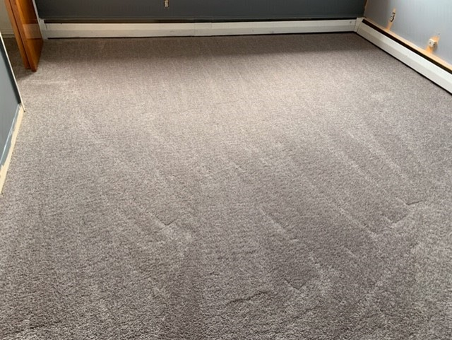 After: plush carpet in the bedroom