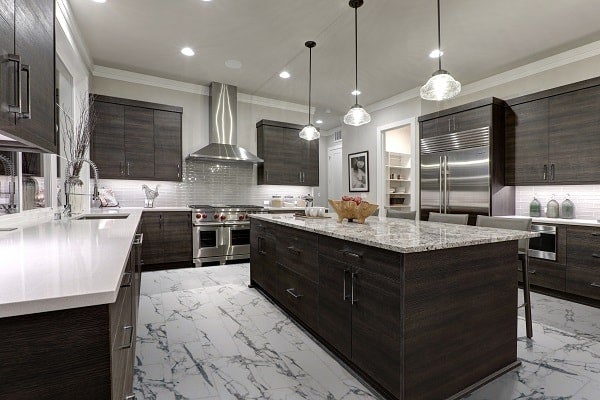 Modern Gray Kitchen Features Dark Gray Flat Front Cabinets Paire