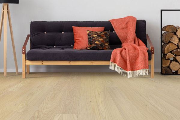 wide plank engineered hardwood with a sofa