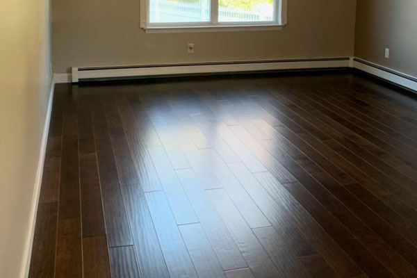 engineered hardwood flooring in an empty master bedroom