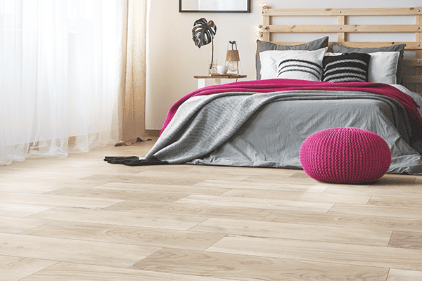 wood look porcelain tile in a bedroom