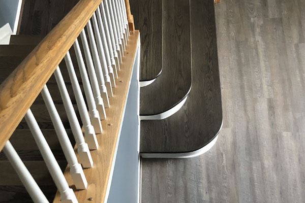 solid hardwood flooring on stairs